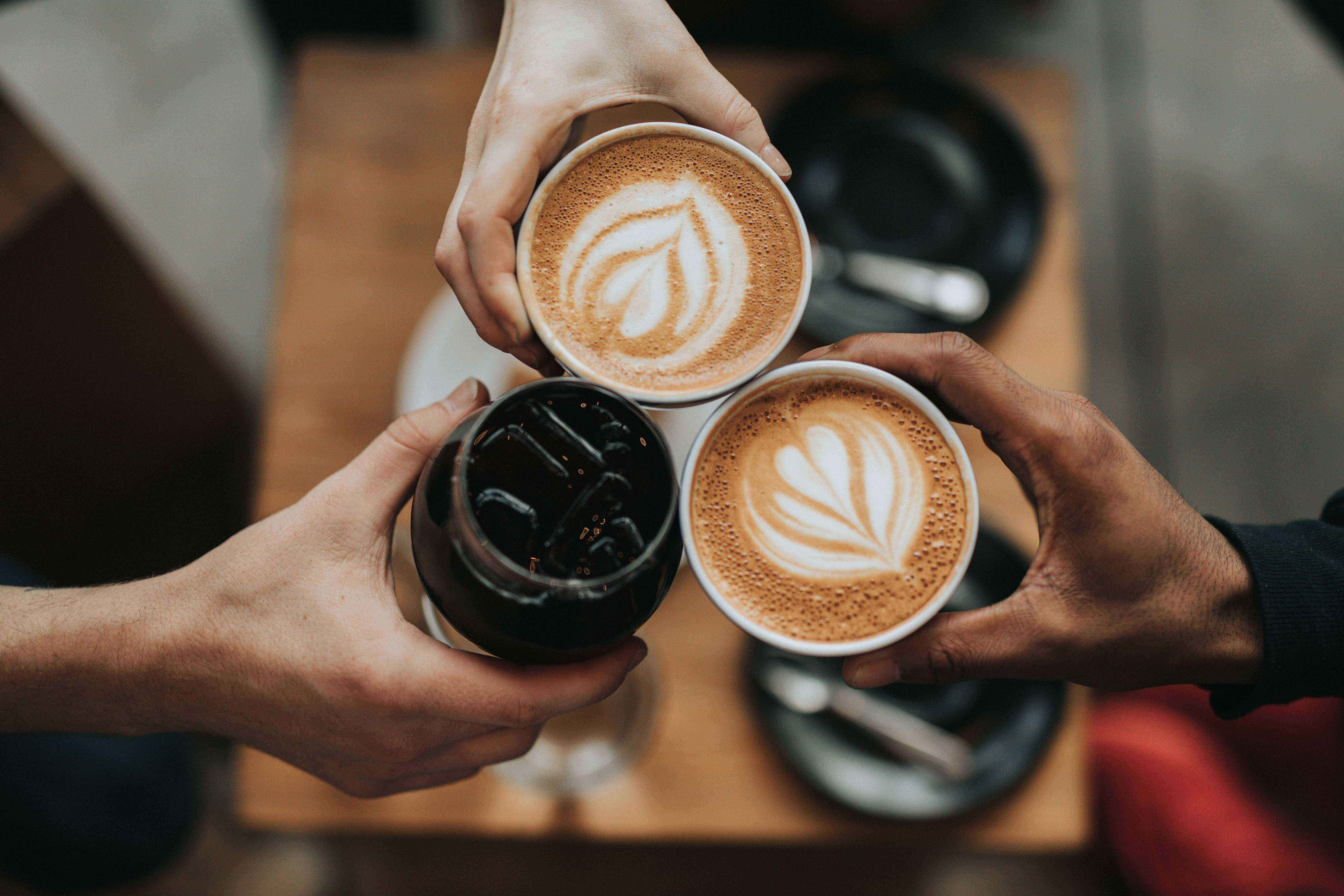 Cheers with coffees